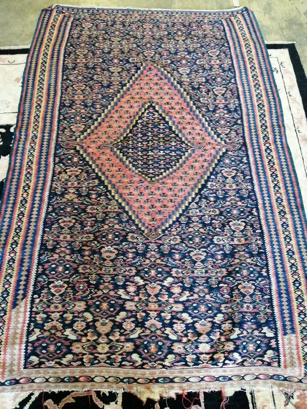 A Senneh Kelim blue ground rug, 19th century, 200 x 130cm